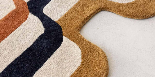 Quel tapis choisir pour un canapé d'angle ? Le guide complet